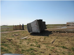 A livestock trailer is turned over and tossed 50 yards. This picture was taken around 1 mile west of Highway 179 in northwest Lubbock County. 