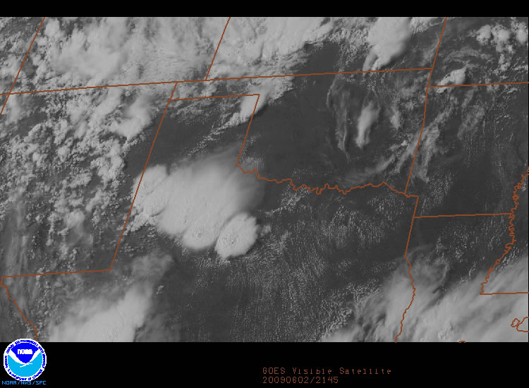 Visible satellite image taken at 4:45 pm on Tuesday, 2 June 2009. Five distinct thunderstorm cells are present stretching fom the South Plains into the Rolling Plains.
