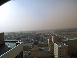 Image taken from Covenant Hospital in Lubbock (looking west) at 3:20 pm . The image shows blowing dust near the height of the strong winds. Image is courtesy of KAMC. Click on the image for a larger view.