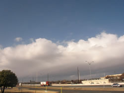 A pictured taken from the Science Spectrum as the band of clouds and precipitation approached during the late morning hours of December 8, 2009. Click on the image for a larger view. 