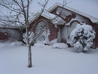 Picture of a snow-covered home southwest Lubbock