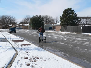 View of a person taking on the snow around Lubbock on Tuesday, February 23, 2010. Click on the image for a larger view.