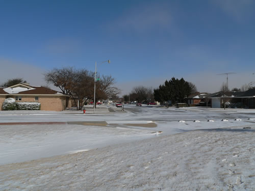 Light snow blanketing Lubbock on Tuesday morning (February 1, 2011). Click on the image for a larger view.