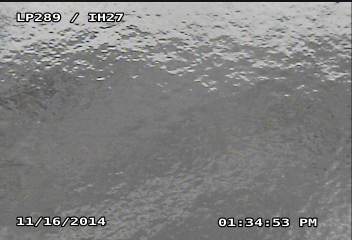 Light coating of ice covering the webcam on Loop 289 and Interstate 27 during the afternoon of 16 November 2014.