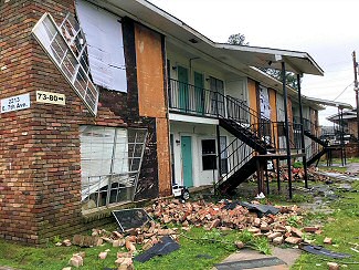 In the same area, bricks were removed from this building and windows were blown out on 05/08/2019.