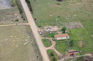 Yet another tornado (rated EF1) destroyed a shop building toward Denmark (White/Jackson County line).