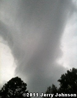A tornado (rated EF2) was captured near Gravel Ridge (Pulaski County) just off of Highway 107 on 04/25/2011. A short time later, the tornado tracked through the Little Rock Air Force Base (Pulaski County). The photo is courtesy of Jerry Johnson.