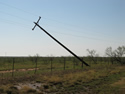 picture of a leaning telephone pole