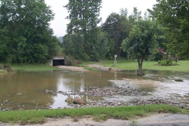 Big Creek and the culvert through which it flows under Highway 107 in southeast Greene County
