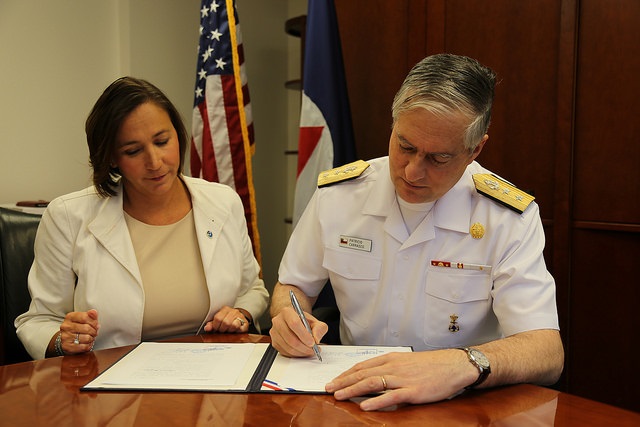 NWS DAA Laura Furgione and SHOA Director Rear Admiral Patricio Carrasco  performed a ceremonial signing of the Spanish official version of a MOU.