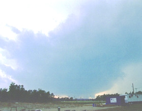 Wall cloud and tornado near the Texas and Louisiana state line