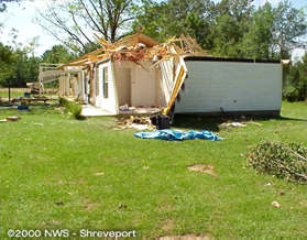 Roof damage to a home in Jena, LA